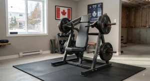 A fully assembled plate-loaded shoulder press machine positioned in a functional training area.